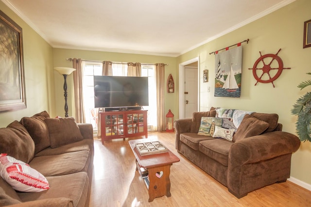 living room featuring crown molding and light wood-type flooring