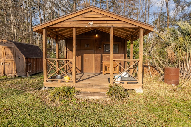 view of outbuilding featuring a lawn