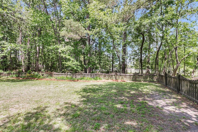 view of yard with a fenced backyard