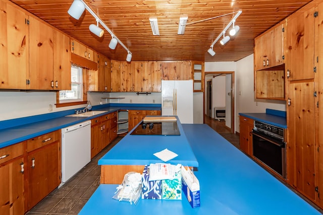 kitchen with black appliances, wood ceiling, sink, and rail lighting