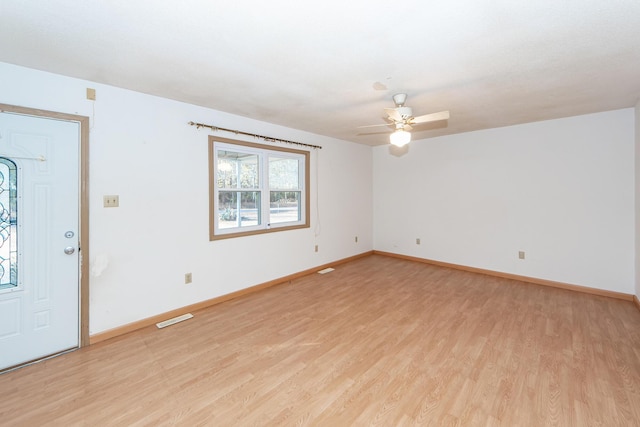 interior space featuring ceiling fan and light hardwood / wood-style flooring