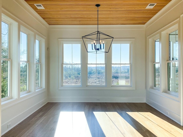 unfurnished sunroom featuring baseboards, wood ceiling, a chandelier, and visible vents