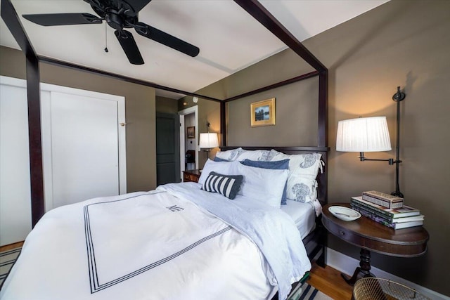 bedroom featuring ceiling fan and wood finished floors