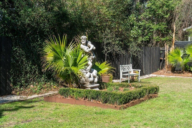 view of yard with fence