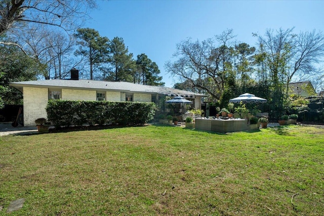 exterior space with an outdoor hangout area