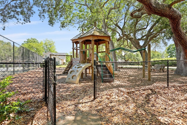 community jungle gym with fence