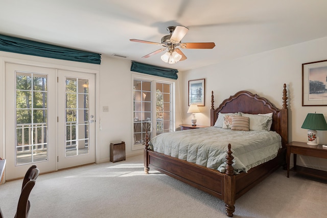 carpeted bedroom featuring ceiling fan and access to outside