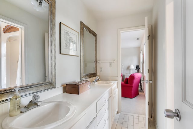 bathroom with double sink vanity and tile flooring