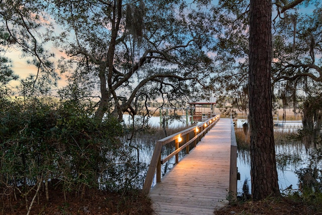 view of dock with a water view