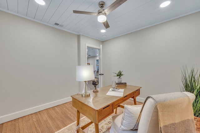 office area featuring light hardwood / wood-style flooring, ornamental molding, and ceiling fan