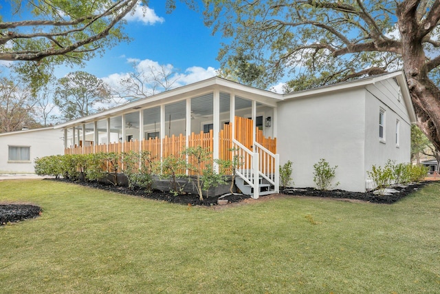 view of front of home featuring a front yard