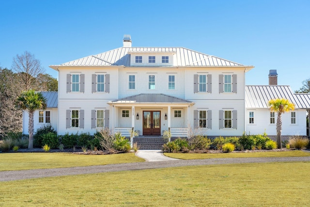 view of front of property featuring a front lawn and a porch