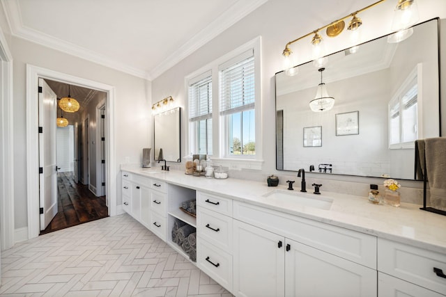 bathroom with ornamental molding, vanity, and hardwood / wood-style floors