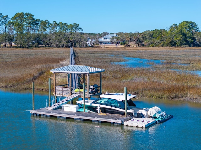 dock area featuring a water view