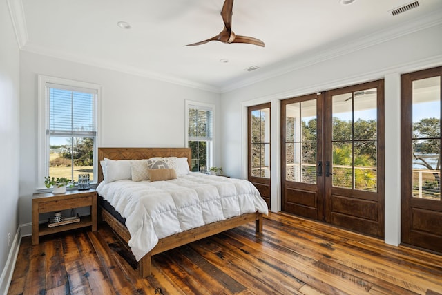 bedroom with ceiling fan, french doors, ornamental molding, access to outside, and dark hardwood / wood-style flooring