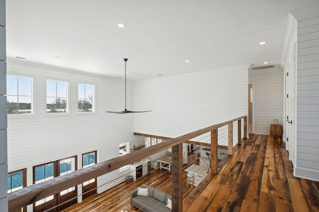 hallway with dark hardwood / wood-style flooring