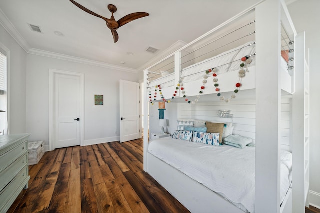 unfurnished bedroom featuring ceiling fan, dark wood-type flooring, and ornamental molding