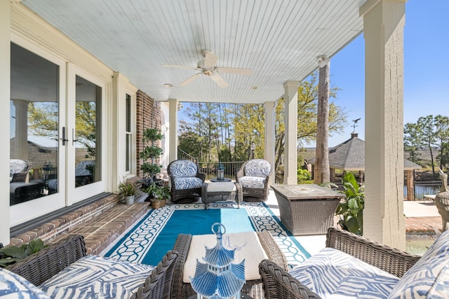 view of patio / terrace featuring ceiling fan and an outdoor hangout area