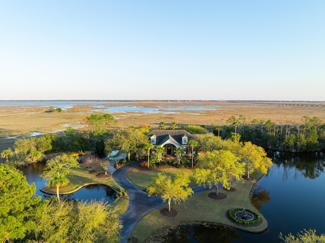 aerial view with a water view and a rural view