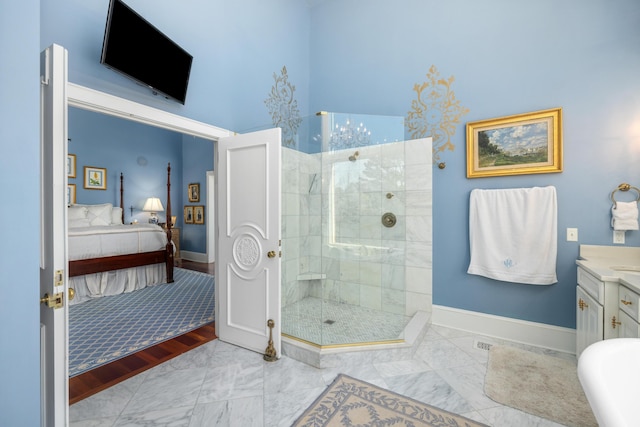 bathroom with vanity, tile flooring, and a shower with shower door