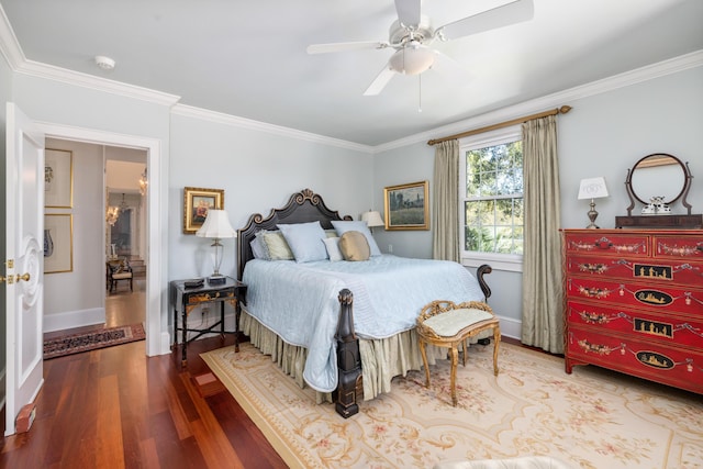 bedroom featuring ceiling fan, light hardwood / wood-style flooring, and crown molding