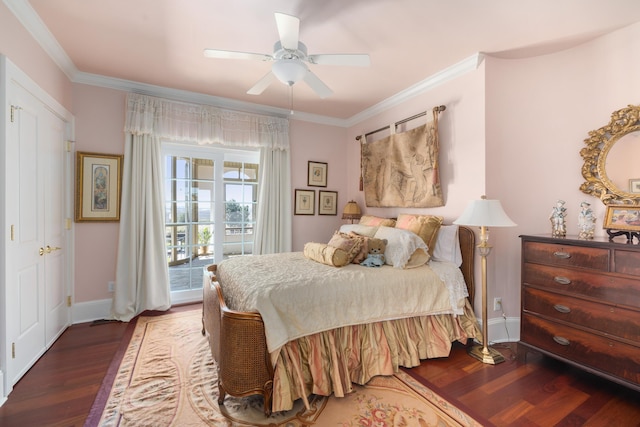 bedroom featuring dark hardwood / wood-style flooring, ceiling fan, crown molding, and access to exterior