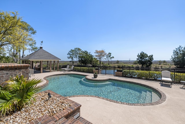 view of swimming pool with a gazebo and a patio area