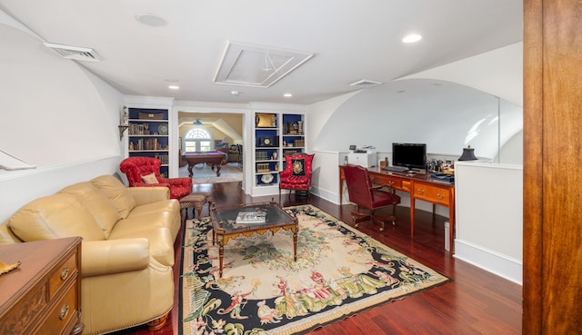 office area featuring built in features and dark wood-type flooring