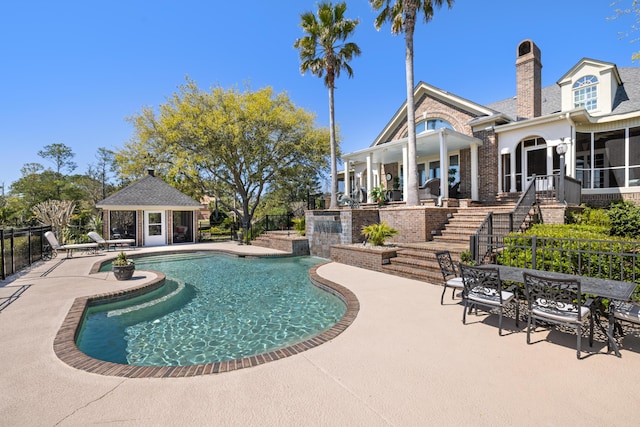 view of swimming pool featuring a patio