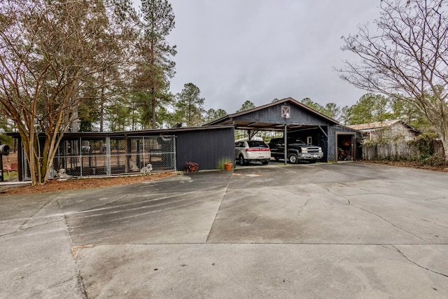 view of side of home with a carport