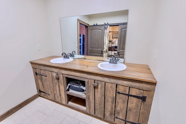 bathroom with tile flooring and dual vanity