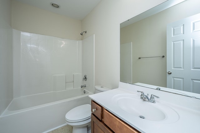 bathroom featuring shower / bath combination, vanity, and toilet