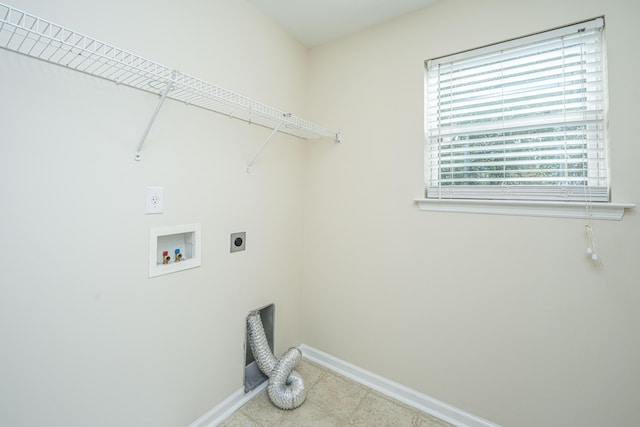 washroom featuring baseboards, laundry area, washer hookup, and hookup for an electric dryer