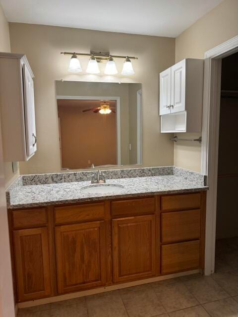 bathroom with vanity, tile patterned floors, and ceiling fan