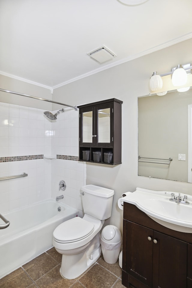 full bathroom with vanity, tiled shower / bath combo, toilet, and tile patterned floors