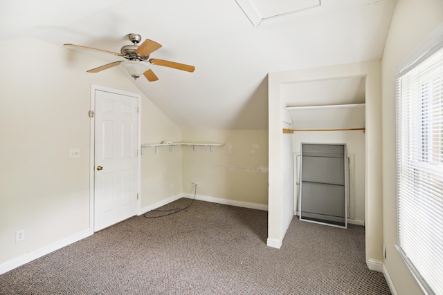 bonus room featuring ceiling fan, lofted ceiling, and carpet flooring