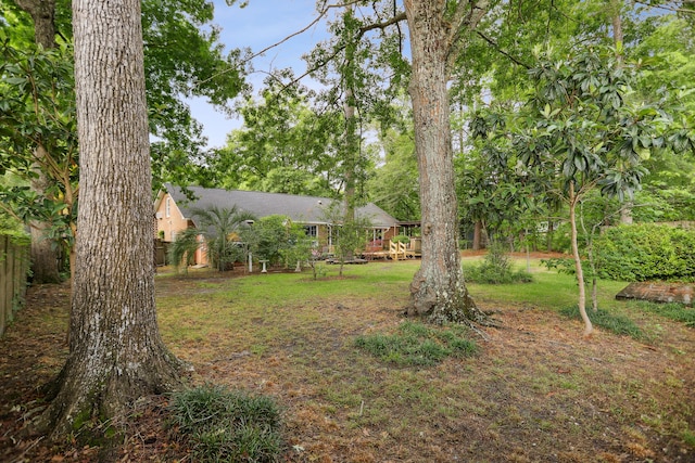 view of yard with a deck