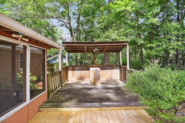 wooden deck featuring a pergola