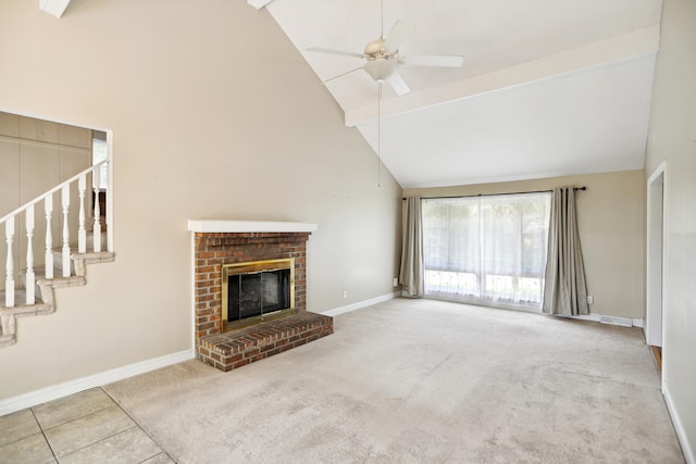 unfurnished living room featuring light tile patterned floors, a brick fireplace, ceiling fan, and high vaulted ceiling