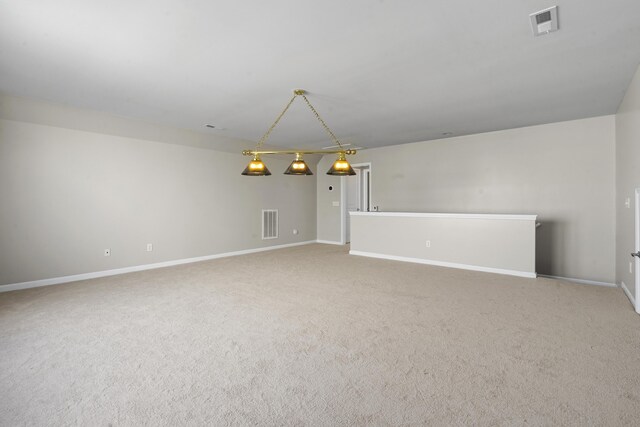 unfurnished bedroom featuring ceiling fan, light colored carpet, and a closet