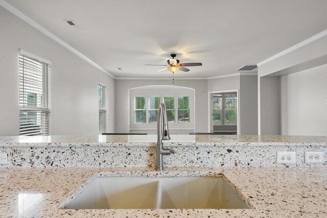 unfurnished room featuring ceiling fan and light carpet