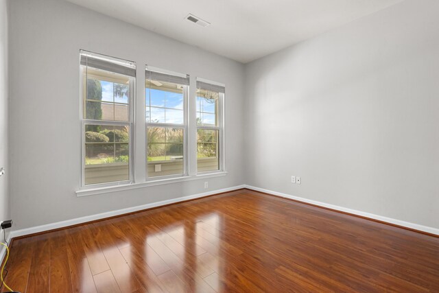 carpeted empty room with ceiling fan and crown molding