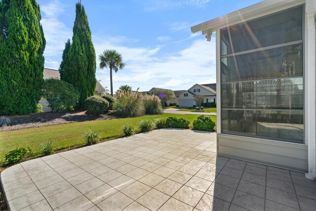 unfurnished sunroom featuring ceiling fan, vaulted ceiling, and a wall mounted AC