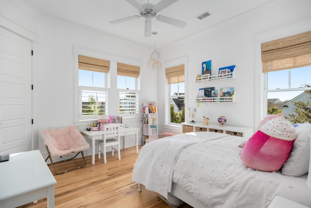 bedroom featuring ceiling fan and wood-type flooring