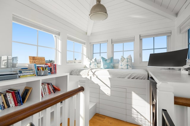 interior space with vaulted ceiling with beams and wooden ceiling