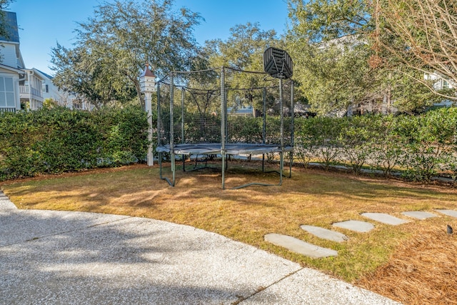 view of yard with a trampoline