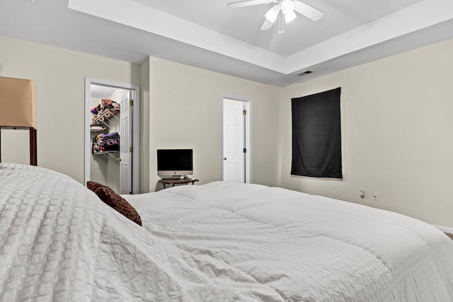 2919 Fernwood Dr, North Charleston, SC 29406 - bedroom with visible vents, a walk in closet, a raised ceiling, and a closet