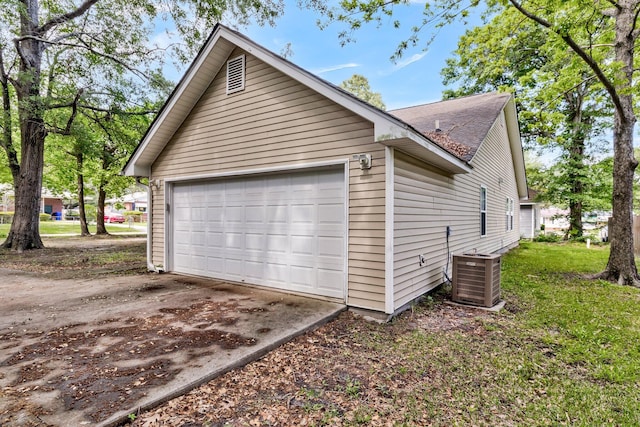 2919 Fernwood Dr, North Charleston, SC 29406 - garage featuring central air condition unit and driveway