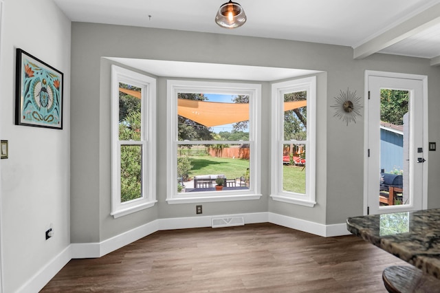 1468 N Relyea Ave, Charleston, SC 29412 - unfurnished dining area featuring wood finished floors and beamed ceiling