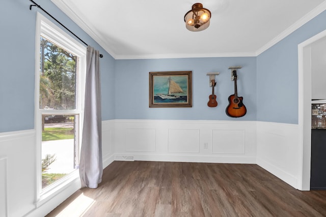 1468 N Relyea Ave, Charleston, SC 29412 - spare room featuring wainscoting, dark wood-type flooring, and ornamental molding